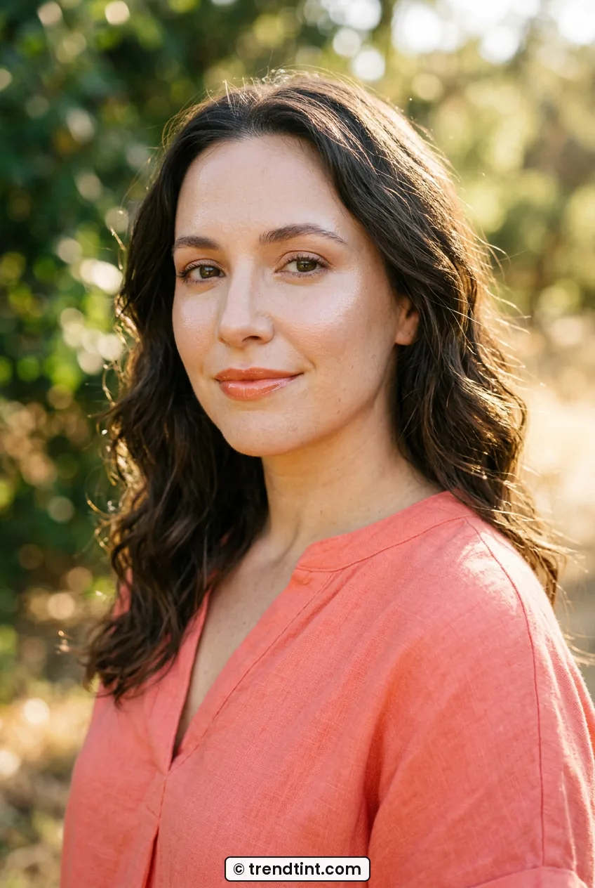 Woman outdoors in sunlight wearing long-lasting dewy summer makeup